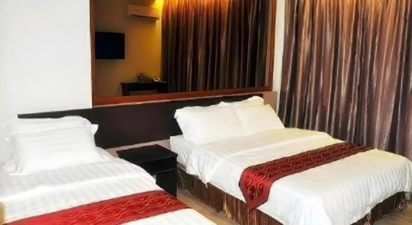 Bed in Goldenhill Hotel