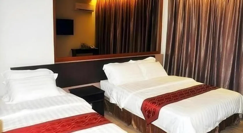 Bed in Goldenhill Hotel