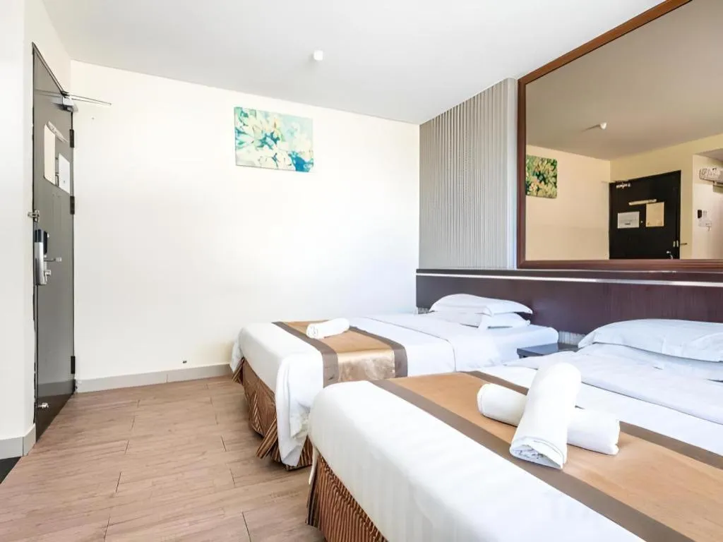 Bed in Goldenhill Hotel