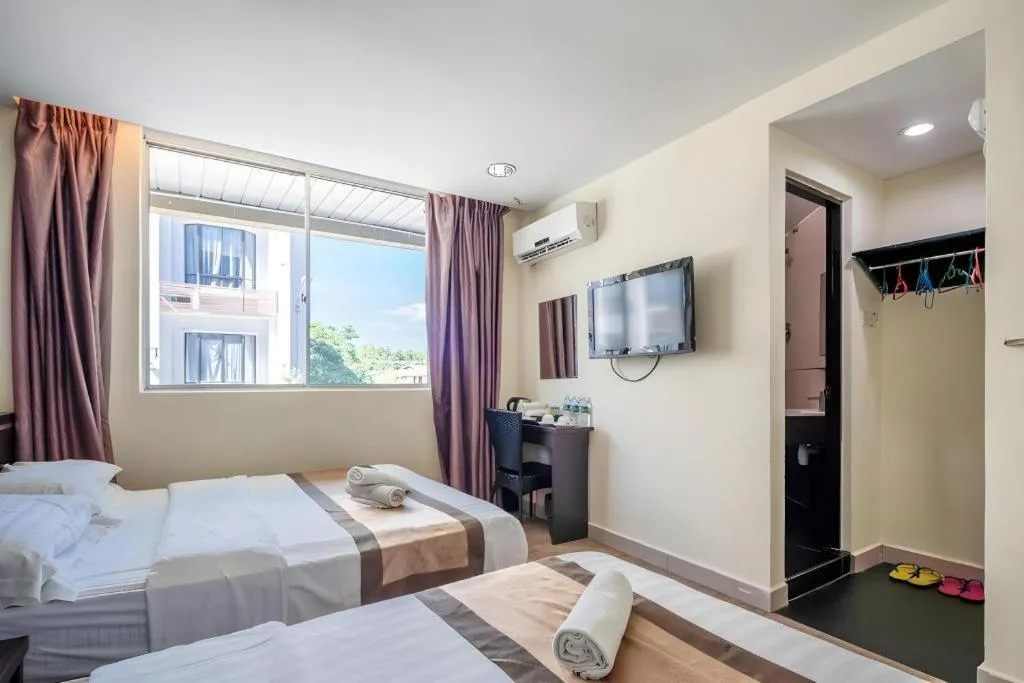 Bed in Goldenhill Hotel