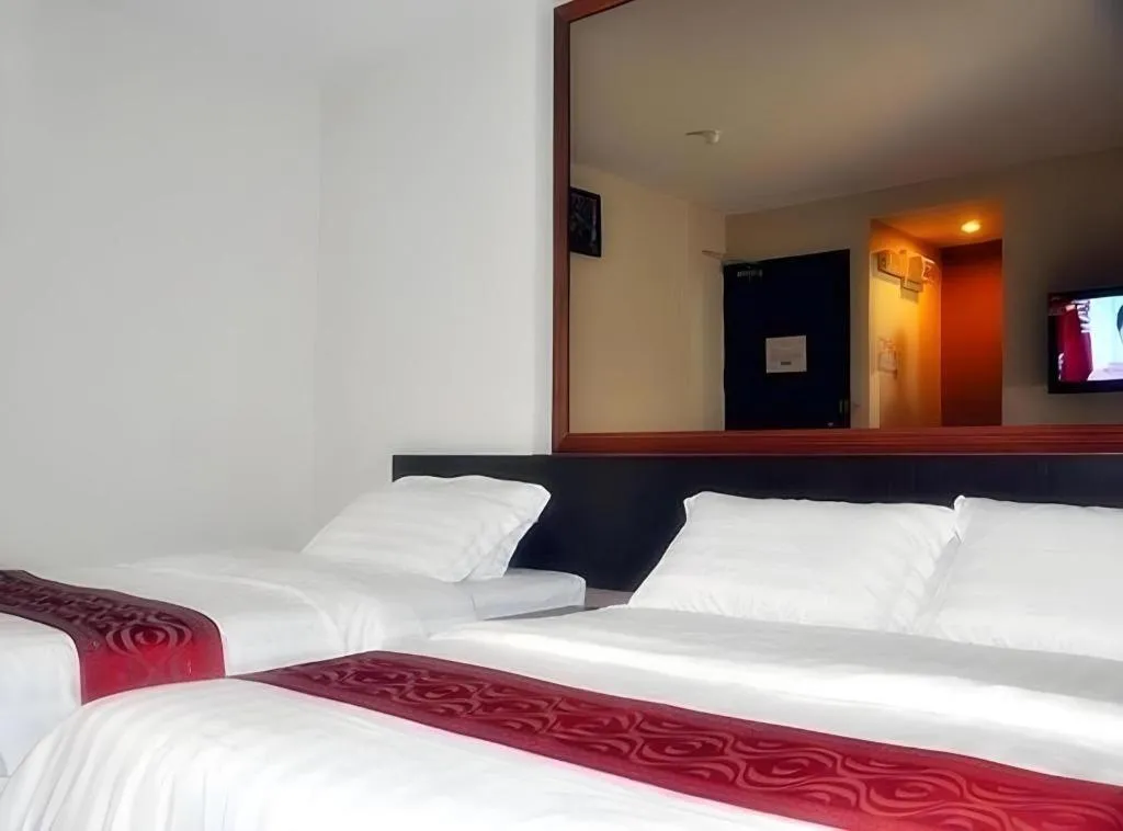 Bed in Goldenhill Hotel