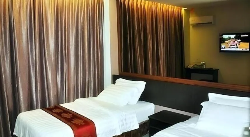 Bed in Goldenhill Hotel