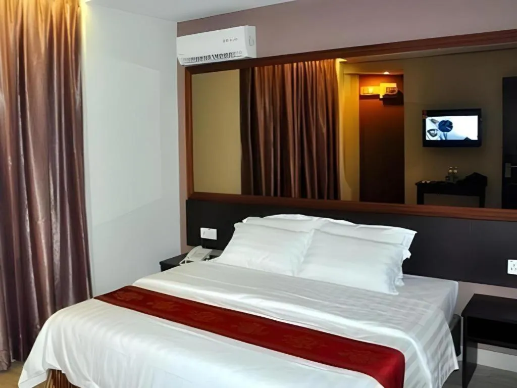 Bed in Goldenhill Hotel