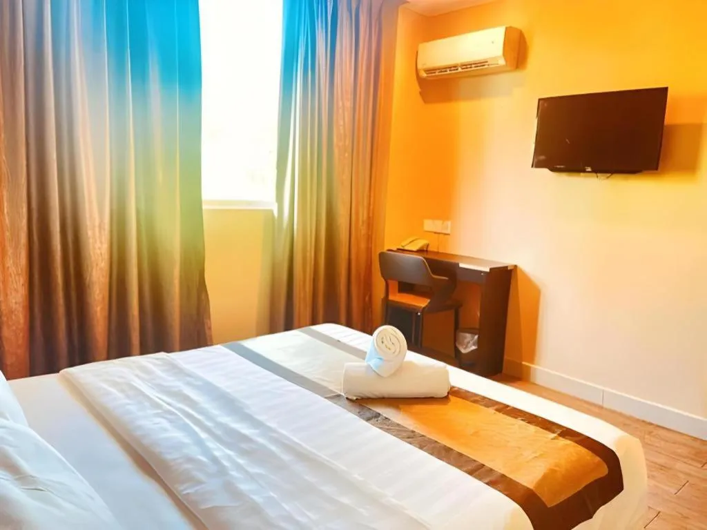 Bed in Goldenhill Hotel