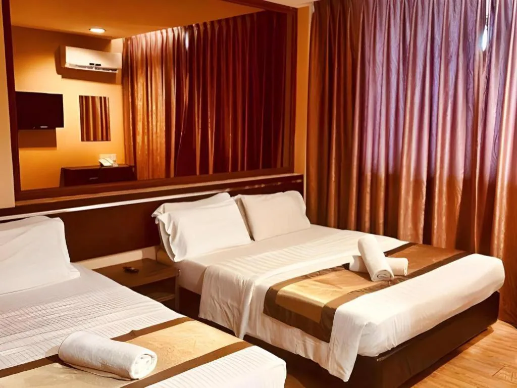 Bed in Goldenhill Hotel