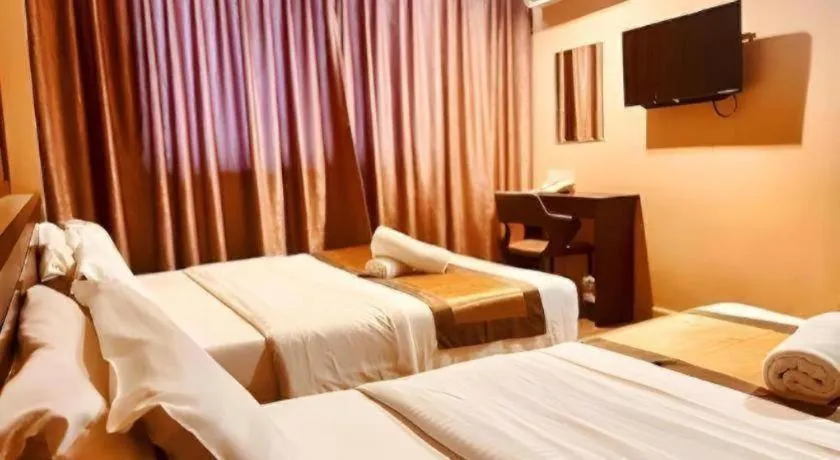 Bed in Goldenhill Hotel