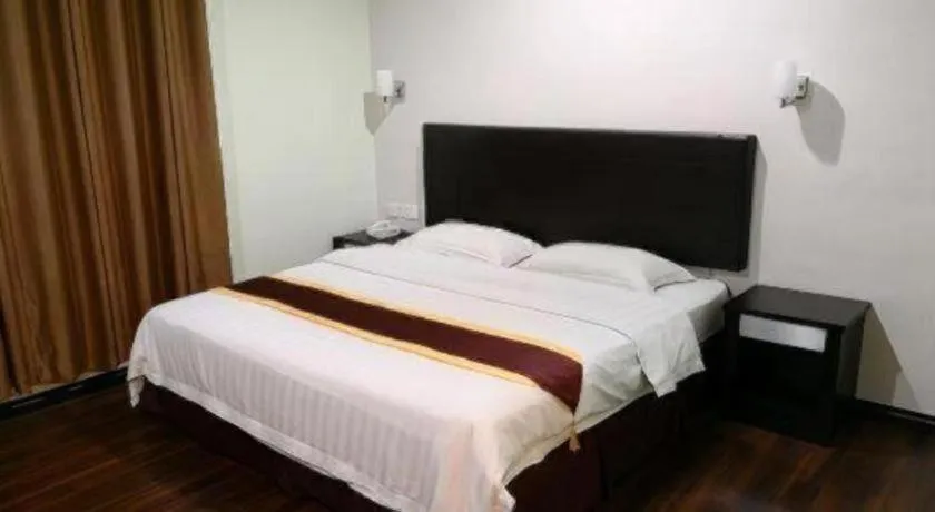 Bed in Han Palace Hotel Semporna