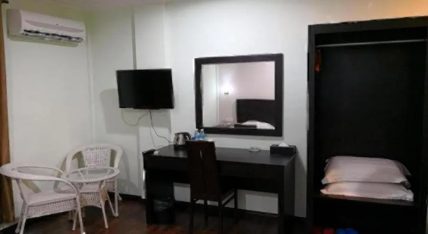 Bed in Han Palace Hotel Semporna