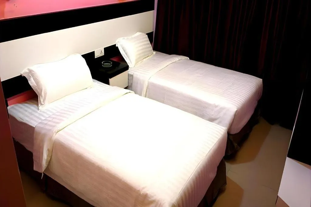 Bed in Hotel Star Moon
