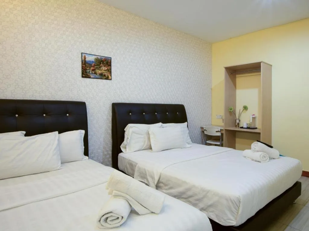 Bed in Hotel Zamburger Sungai Besi