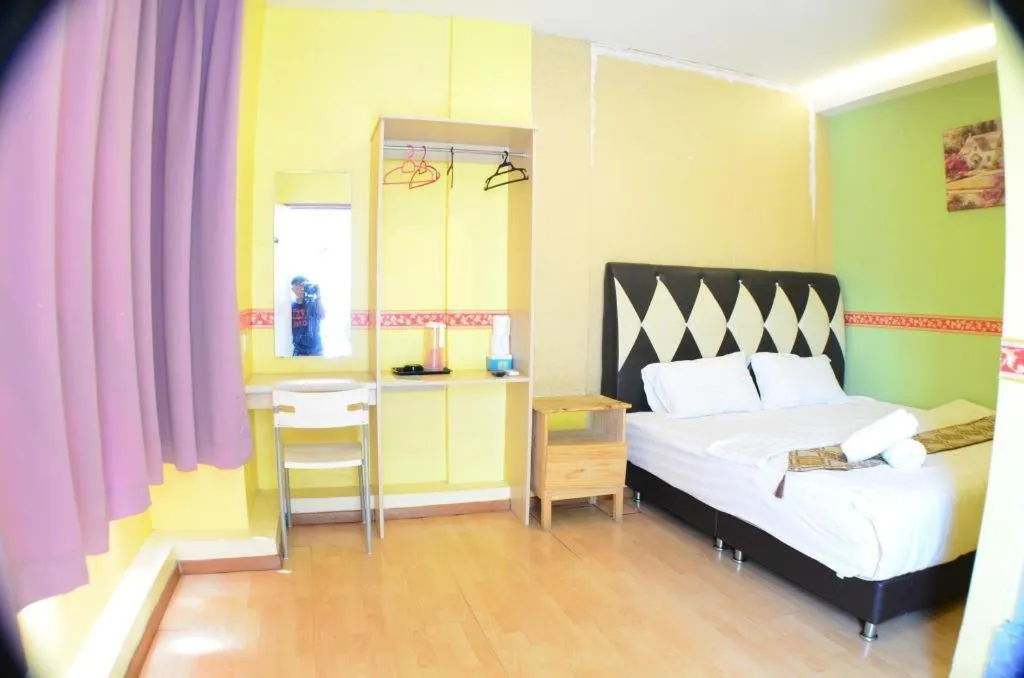 Bed in Hotel Zamburger Sungai Besi