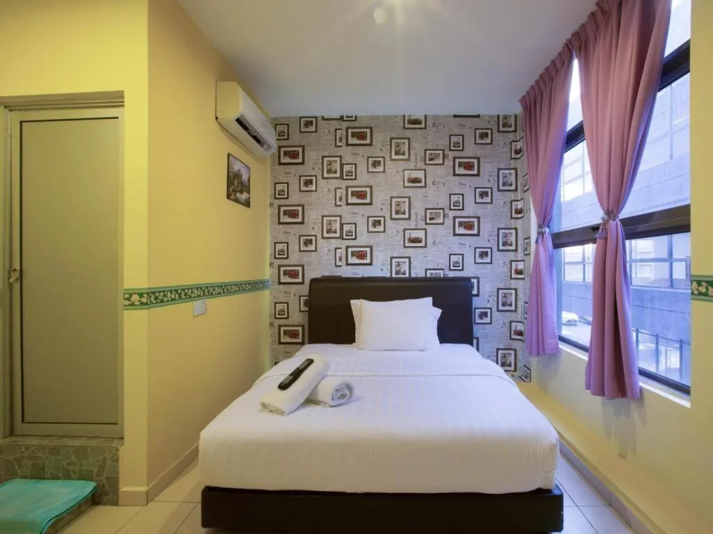 Bed in Hotel Zamburger Sungai Besi