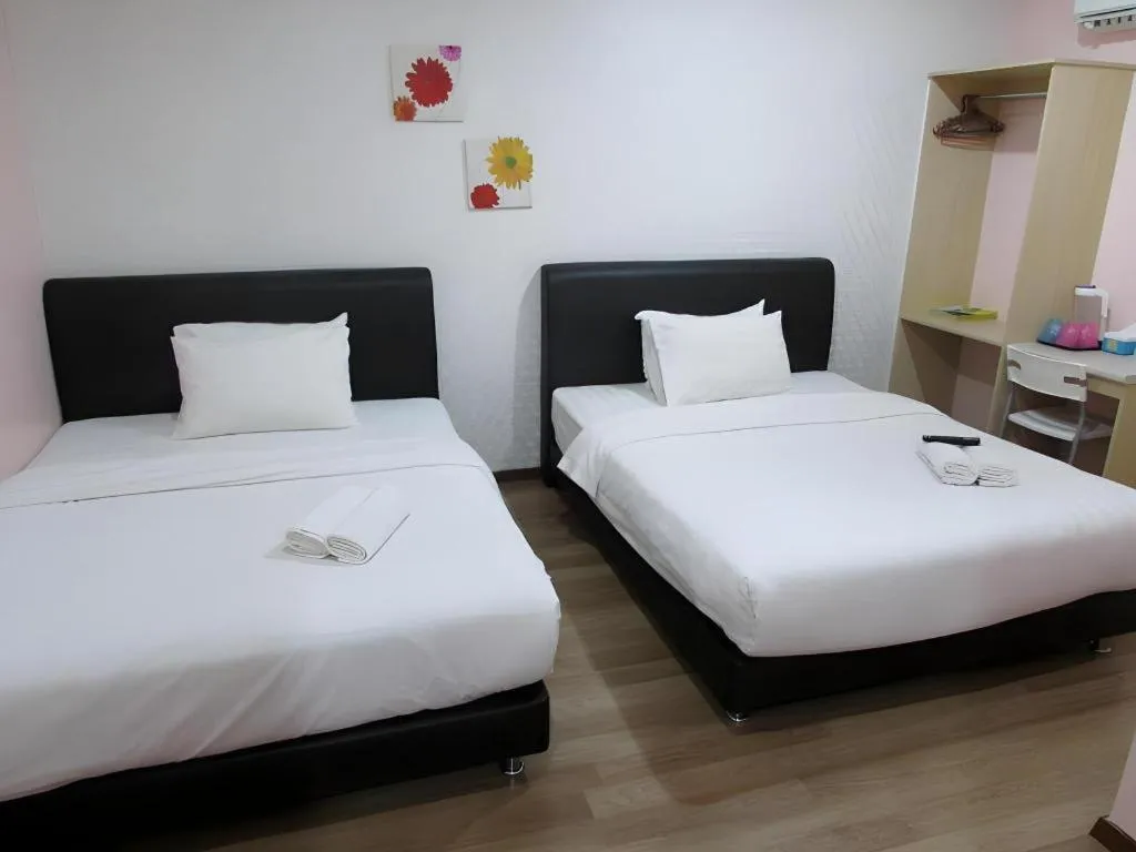 Bed in Hotel Zamburger Sungai Besi