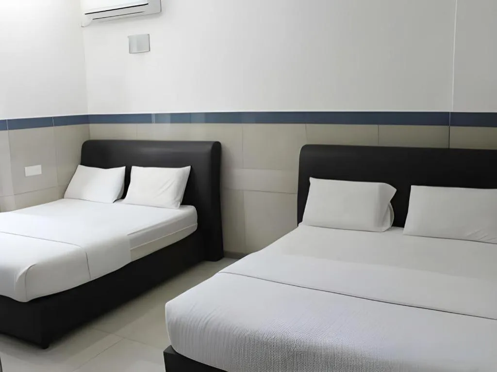 Bed in Burmahtel Hotel