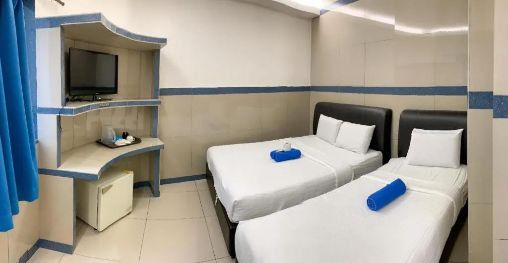 Bed in Burmahtel Hotel