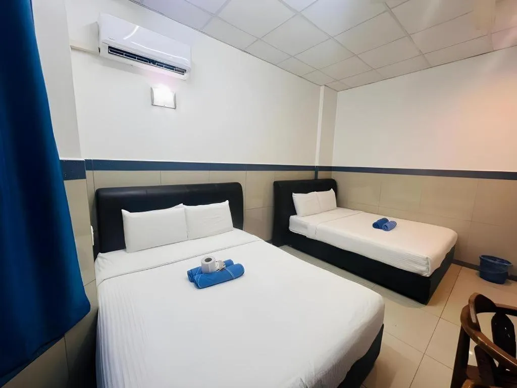 Bed in Burmahtel Hotel