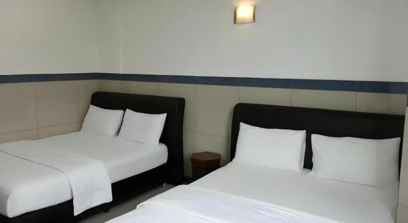 Bed in Burmahtel Hotel