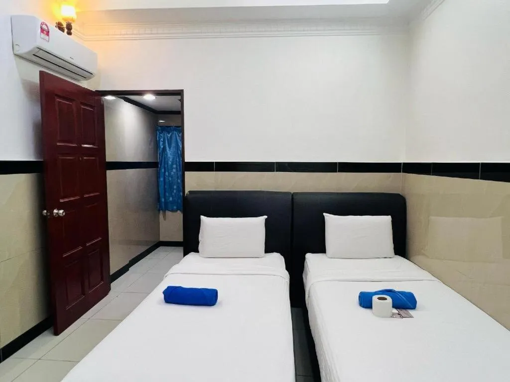 Bed in Burmahtel Hotel