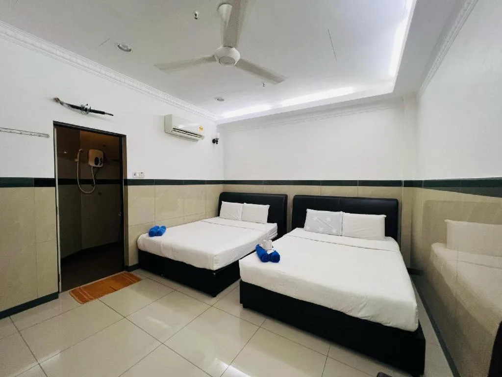 Bed in Burmahtel Hotel