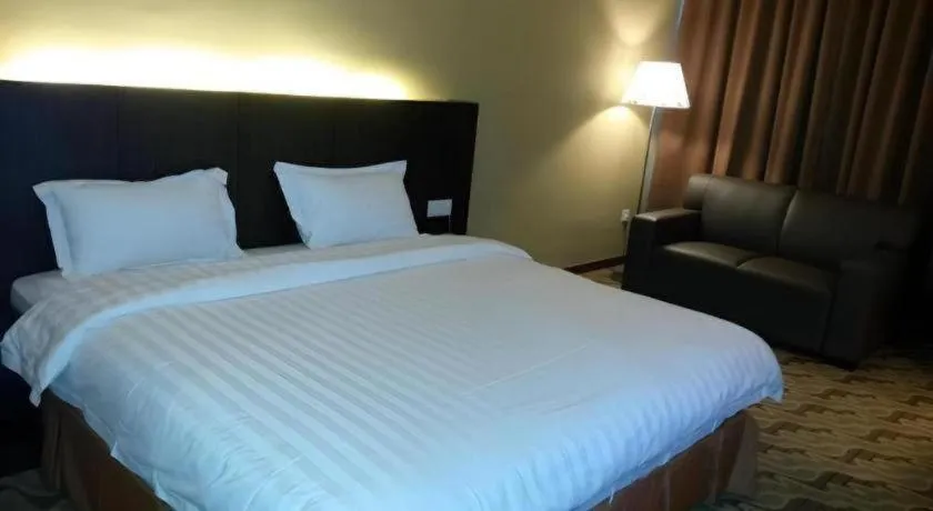 Bed in Eminent Hotel