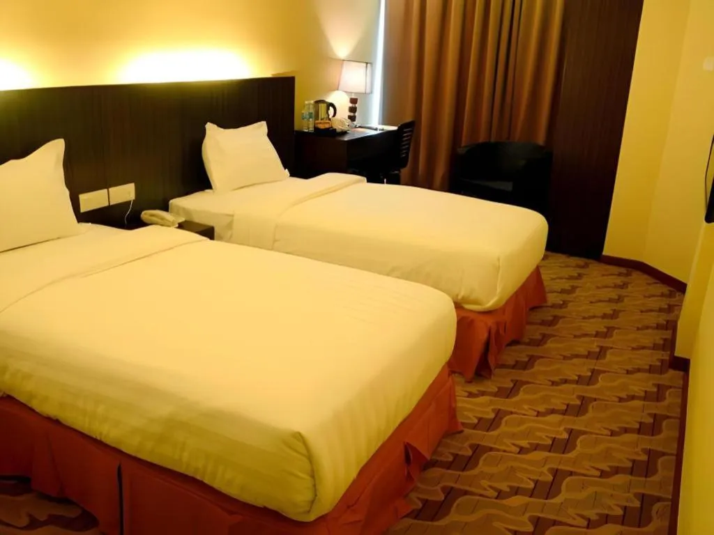 Bed in Eminent Hotel