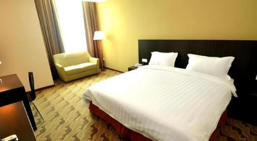 Bed in Eminent Hotel
