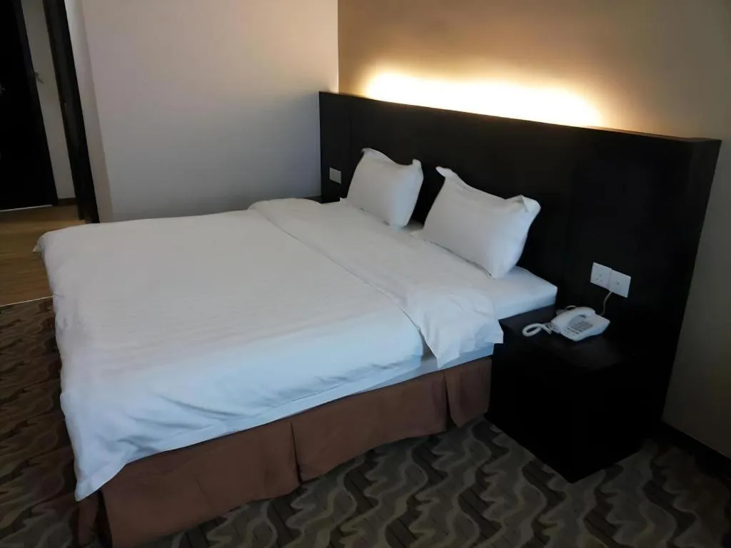 Bed in Eminent Hotel