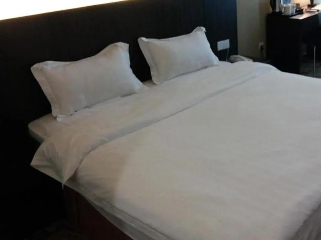 Bed in Eminent Hotel