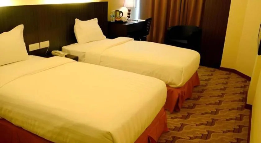 Bed in Eminent Hotel