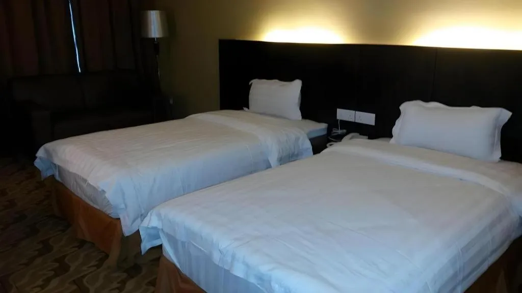 Bed in Eminent Hotel