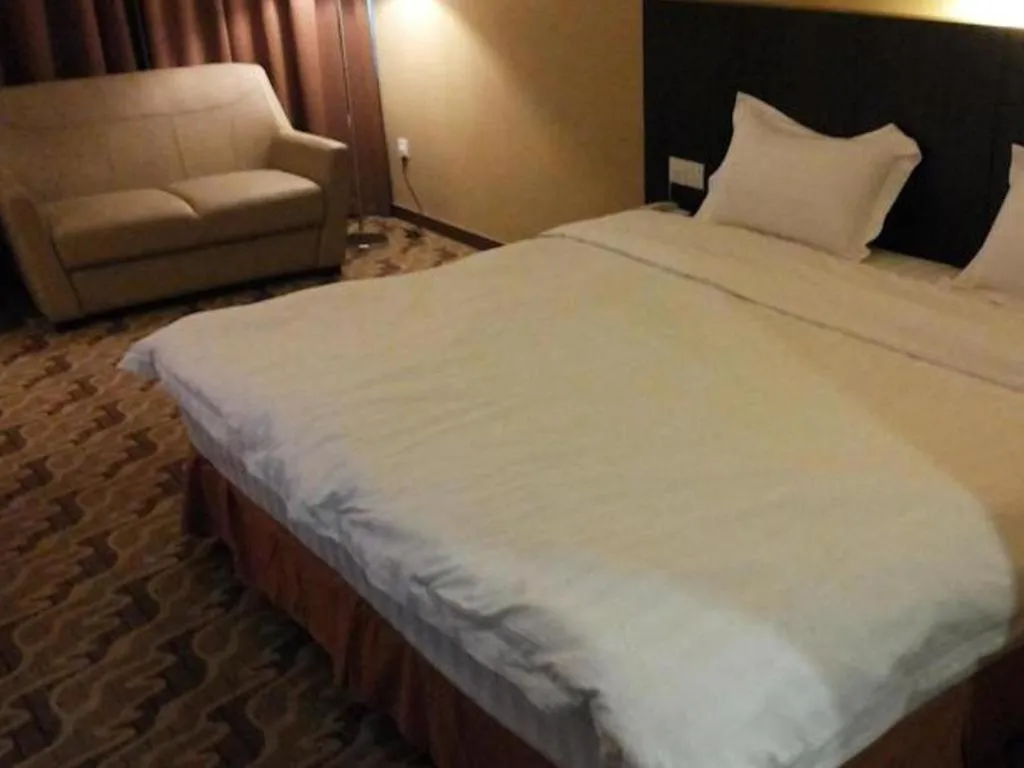 Bed in Eminent Hotel