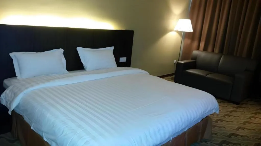 Bed in Eminent Hotel