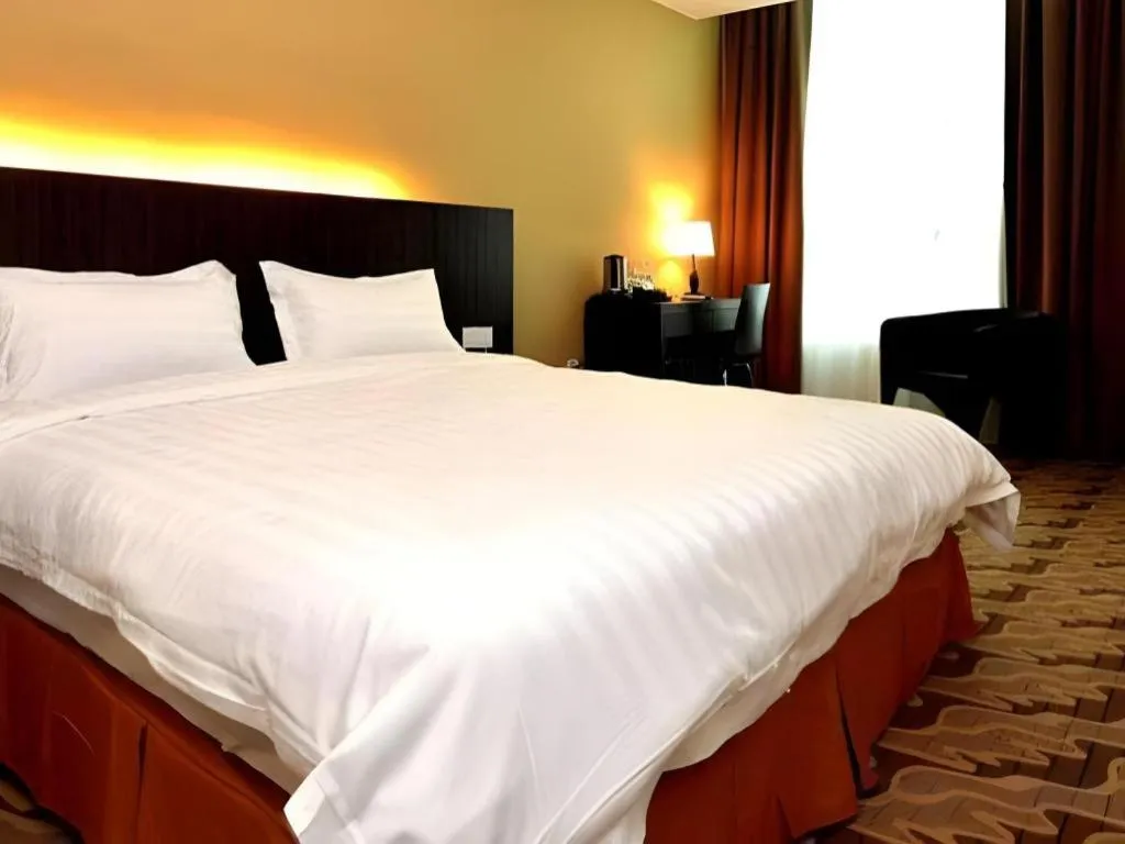 Bed in Eminent Hotel