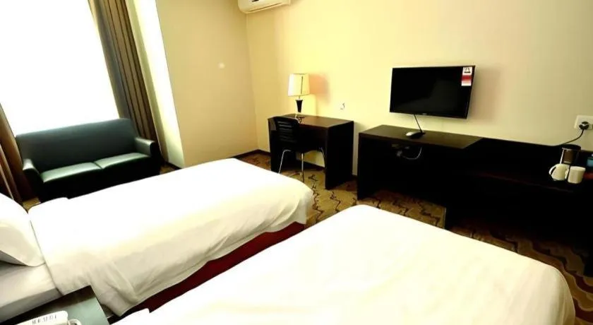 Bed in Eminent Hotel