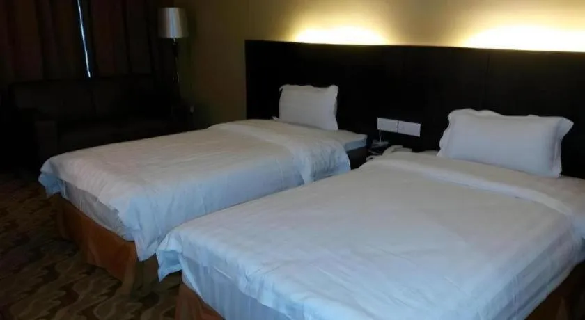 Bed in Eminent Hotel
