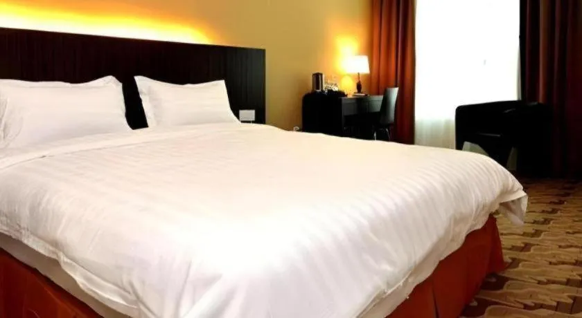 Bed in Eminent Hotel