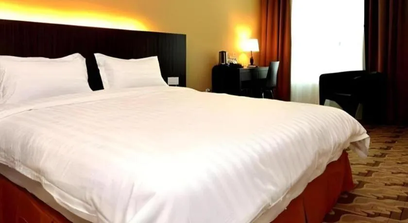 Bed in Eminent Hotel