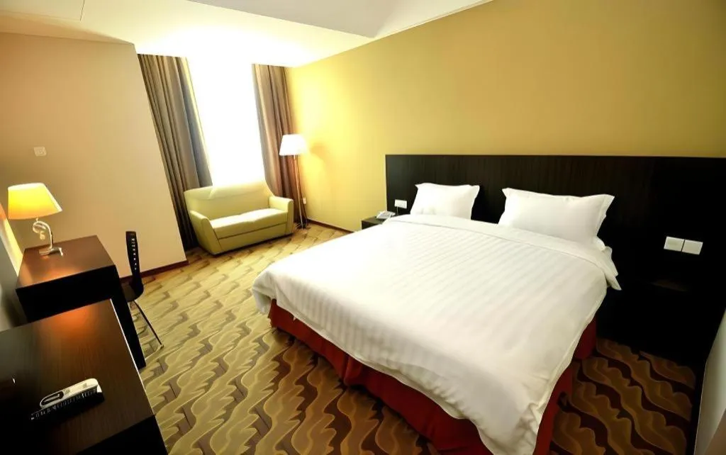 Bed in Eminent Hotel