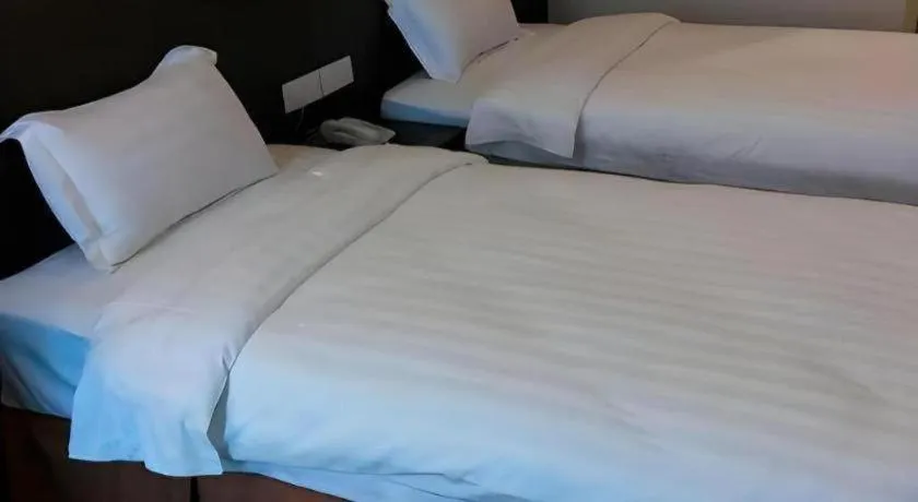 Bed in Eminent Hotel