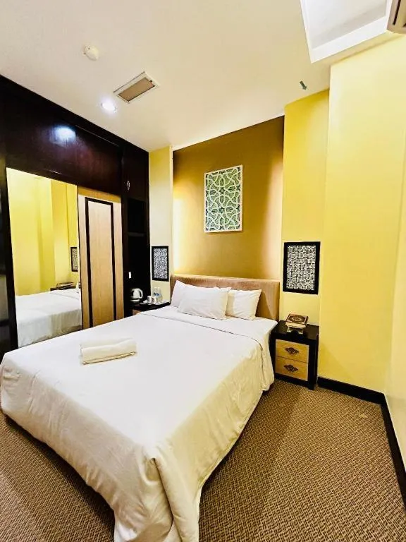 Bed in Hotel El Zahraa