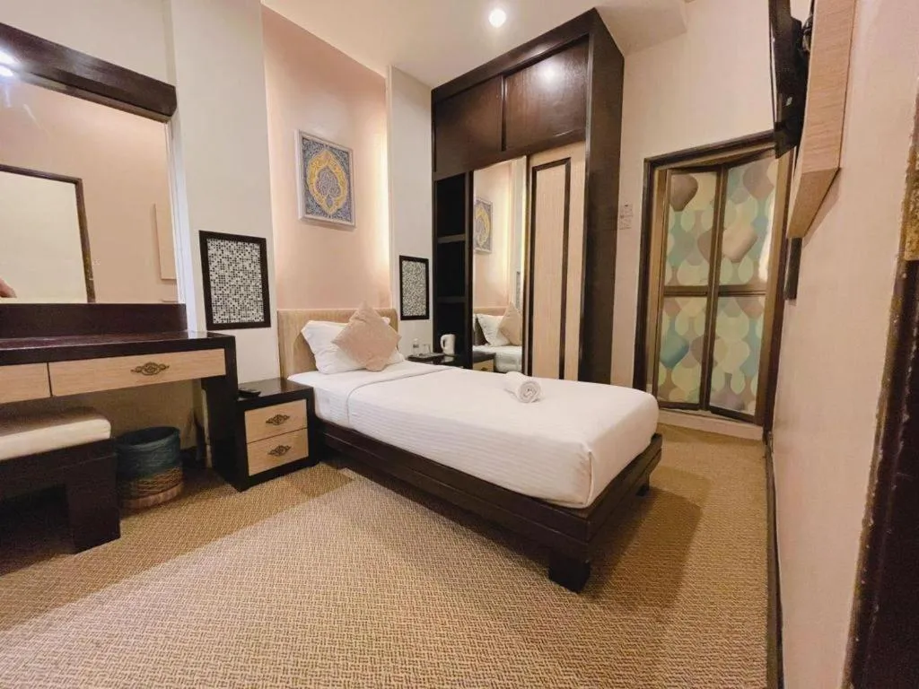 Bed in Hotel El Zahraa