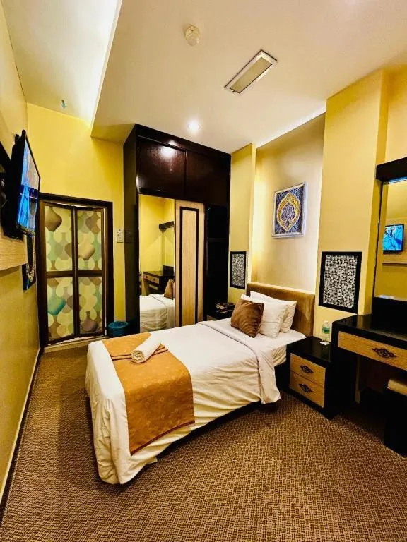 Bed in Hotel El Zahraa