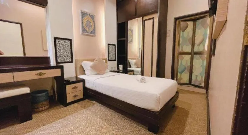 Bed in Hotel El Zahraa