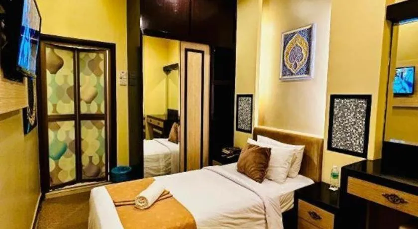 Bed in Hotel El Zahraa