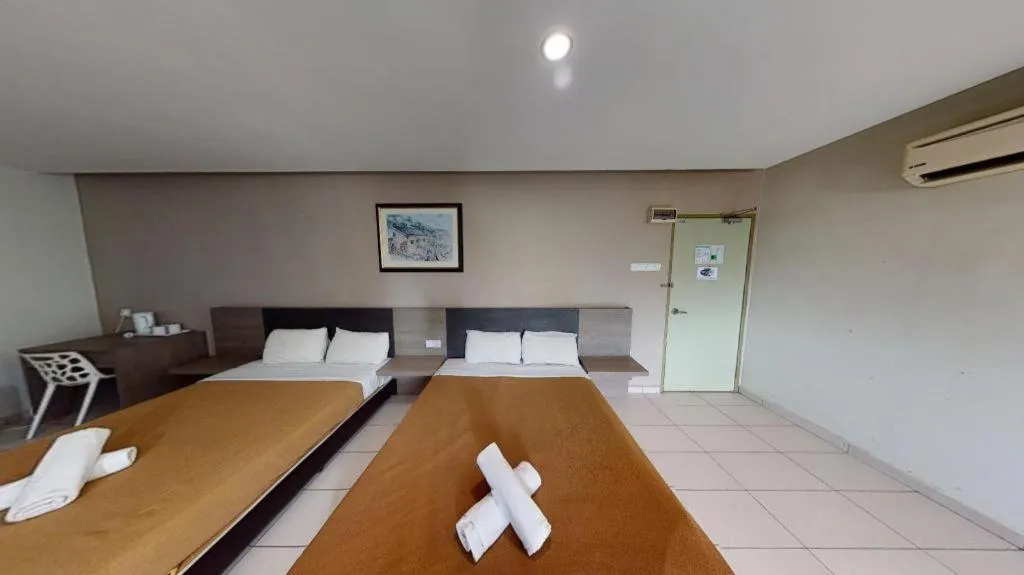 Bed in Hotel Suria Malaqa