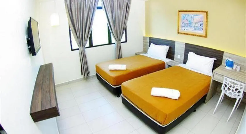 Bed in Hotel Suria Malaqa