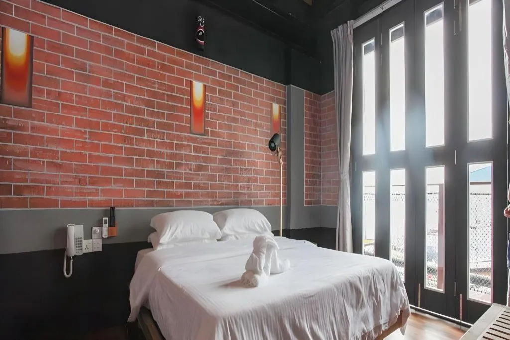 Bed in The Happy 8 Retreat @ Kuala Sepetang