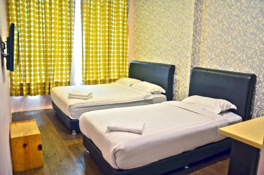 Bed in Hotel Zamburger Bentong