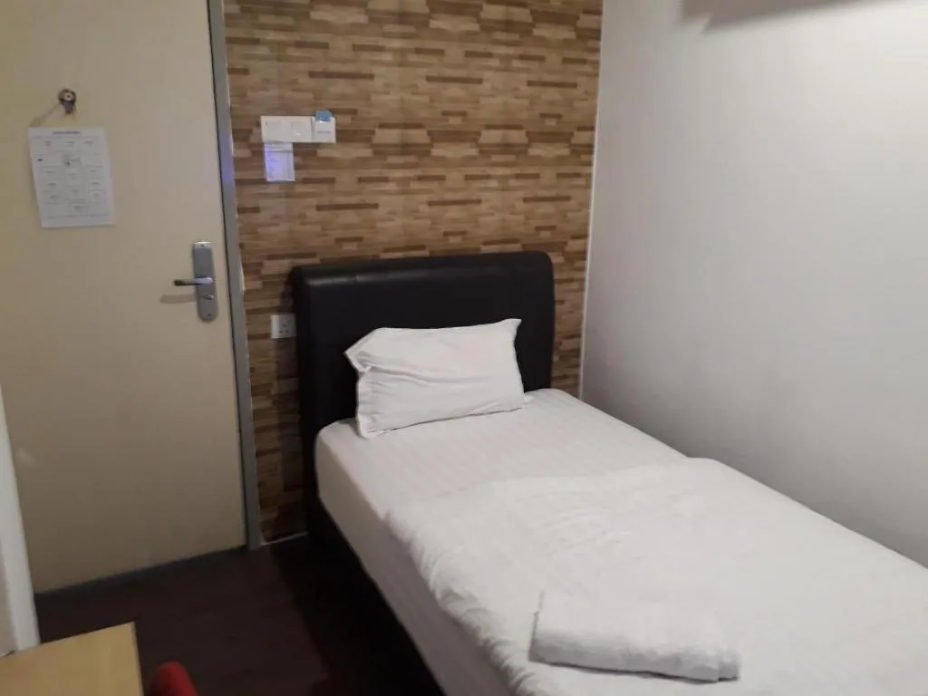 Bed in Hotel Zamburger Bentong