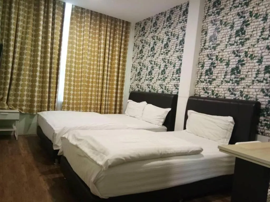 Bed in Hotel Zamburger Bentong